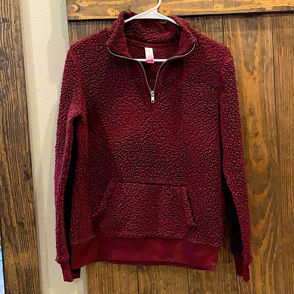 This is a medium maroon NOBO pull over